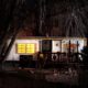 Art, Chris Moss, Portfolio image of conceptual art trailer house at night with trees