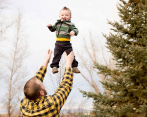 Moss Image, Portrait, Moab Photographer, Dad throwing son in air