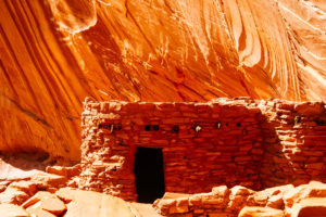 Landscape, red sandstone native american structure