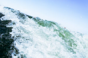 Chris Moss, Moss Image, Moab Photographer, Picture of a wave against a blue sky background