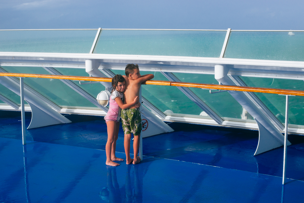 kids standing on bow of ship upper deck, travel, cuba, moss image